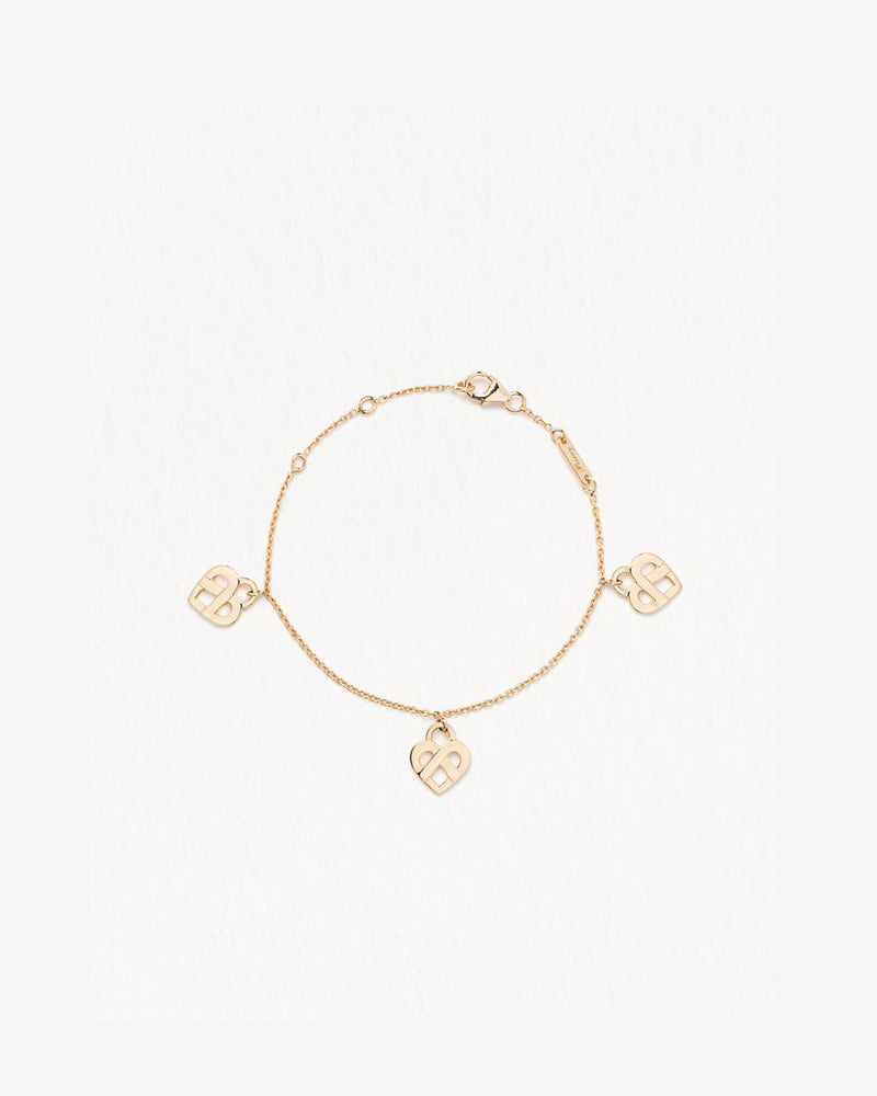 
                  
                    Poiray Bracelet 3  Cœurs  Entrelacé en or jaune 18 carats . Référence : 628205
                  
                